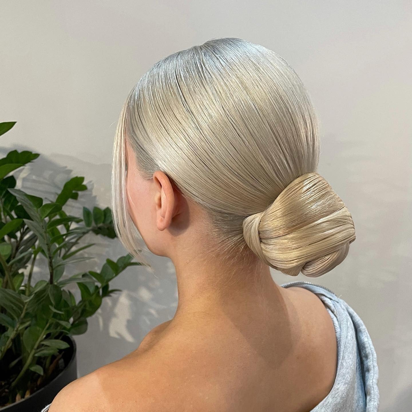 13. Sleek Low Bun with Platinum Blonde (Simple Hairstyles)