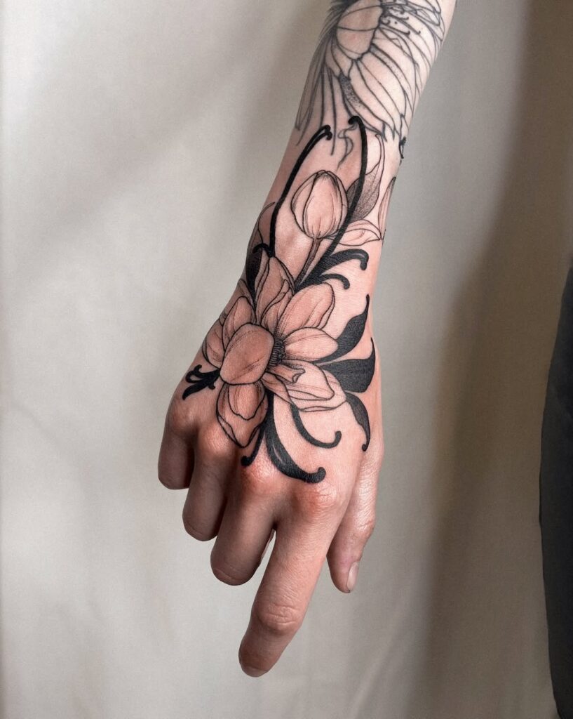 Lily Hand Tattoo