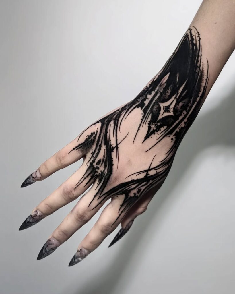 Dark Art Hand Tattoo