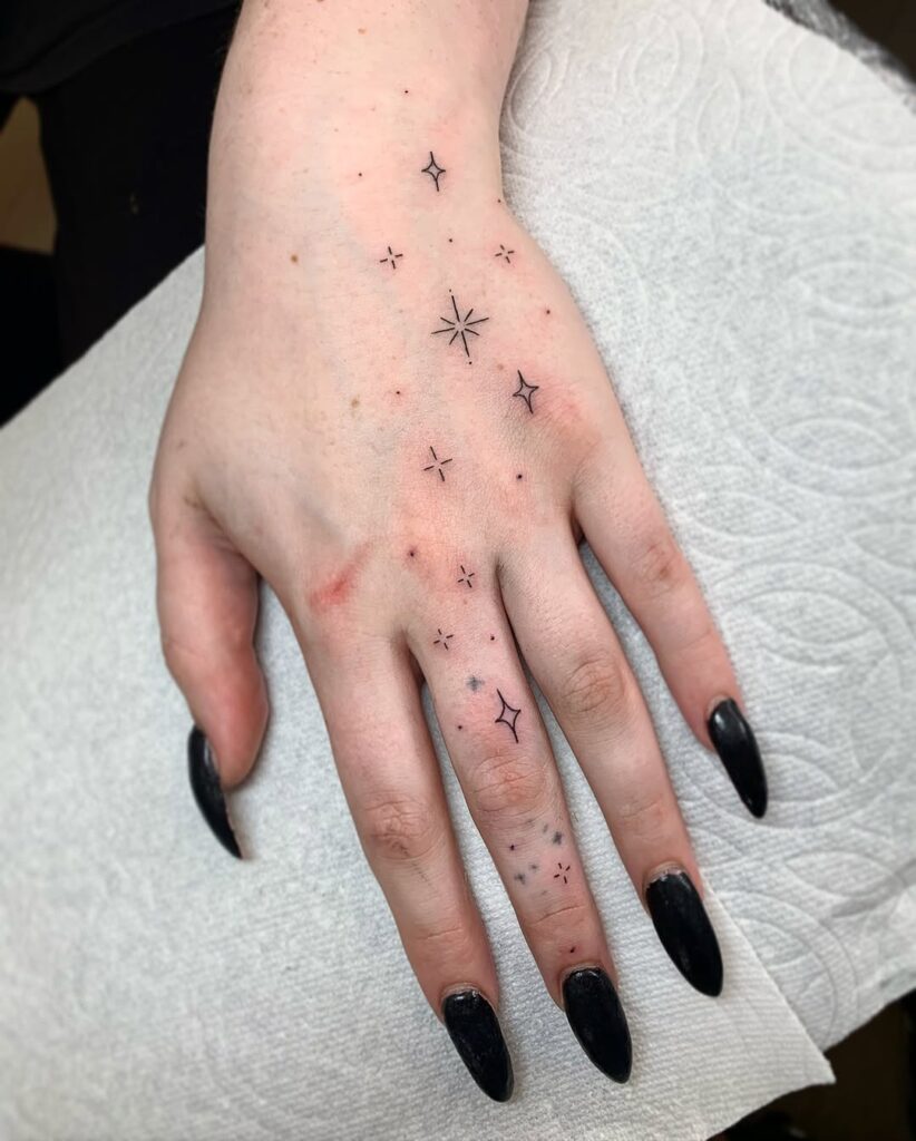 Sparkles Hand Tattoo