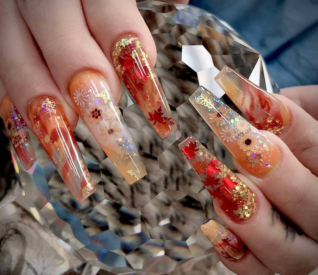 6. Glittered Harvest Leaves (Thanksgiving Nail Ideas)