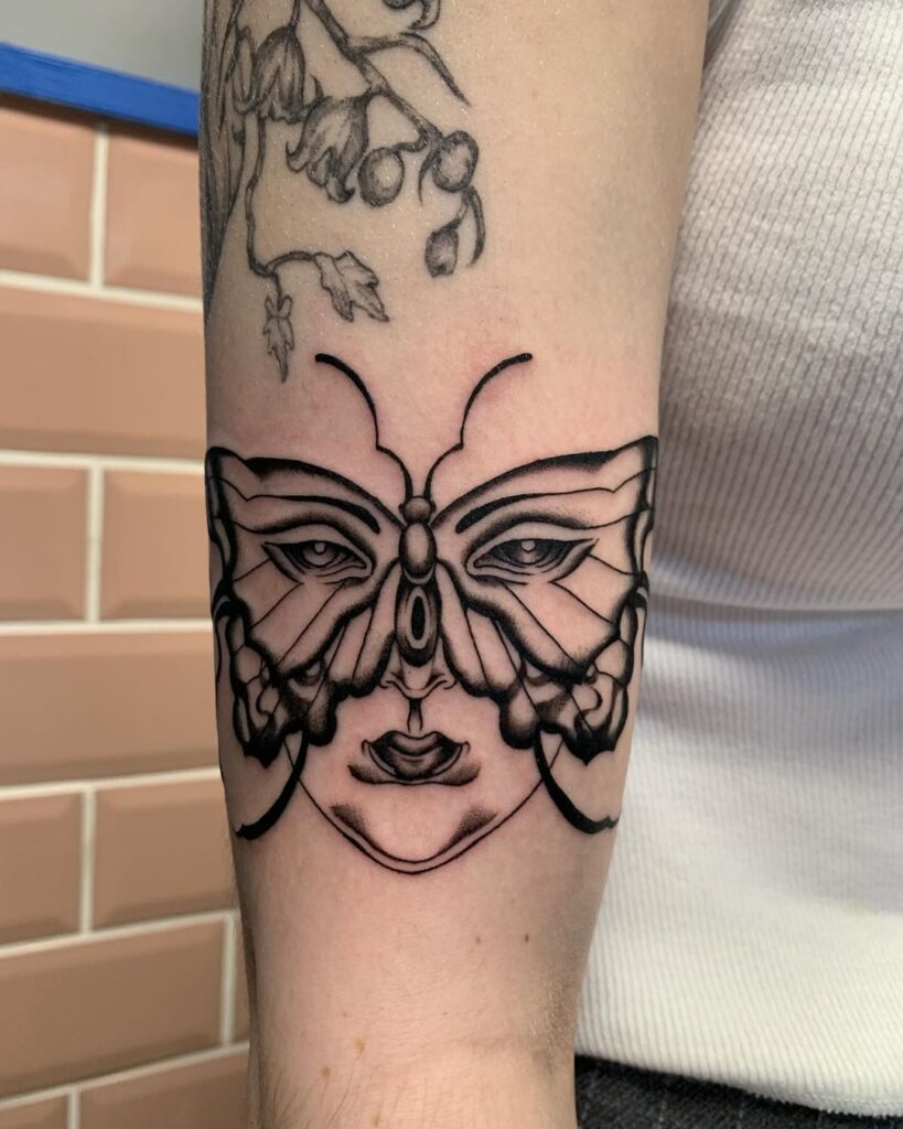 Butterfly Face Tattoo