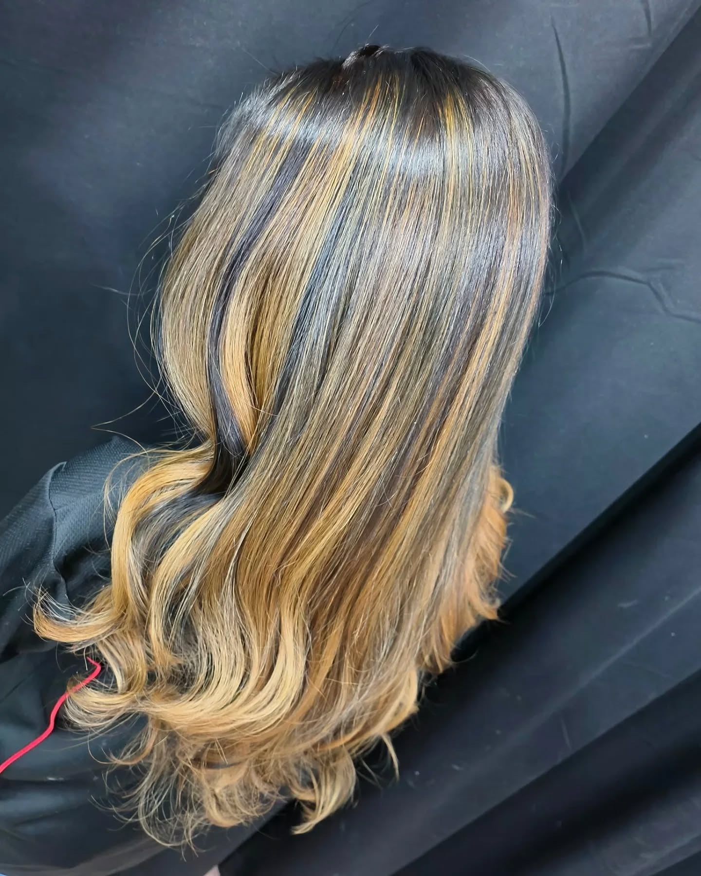 3. Soft Curls with Warm Caramel Veils (Caramel Balayage with Highlights)