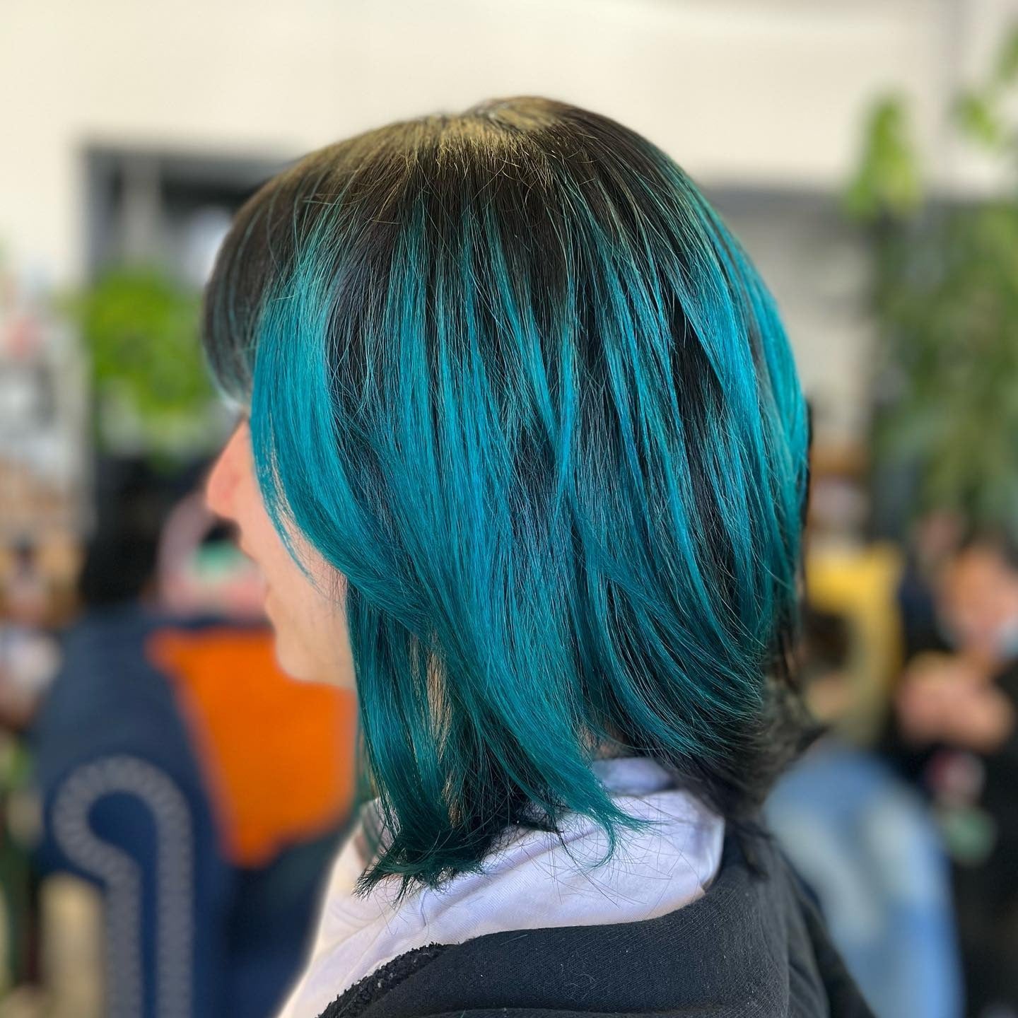 1. Layered Teal Medium Cut (Teal Hair Color)