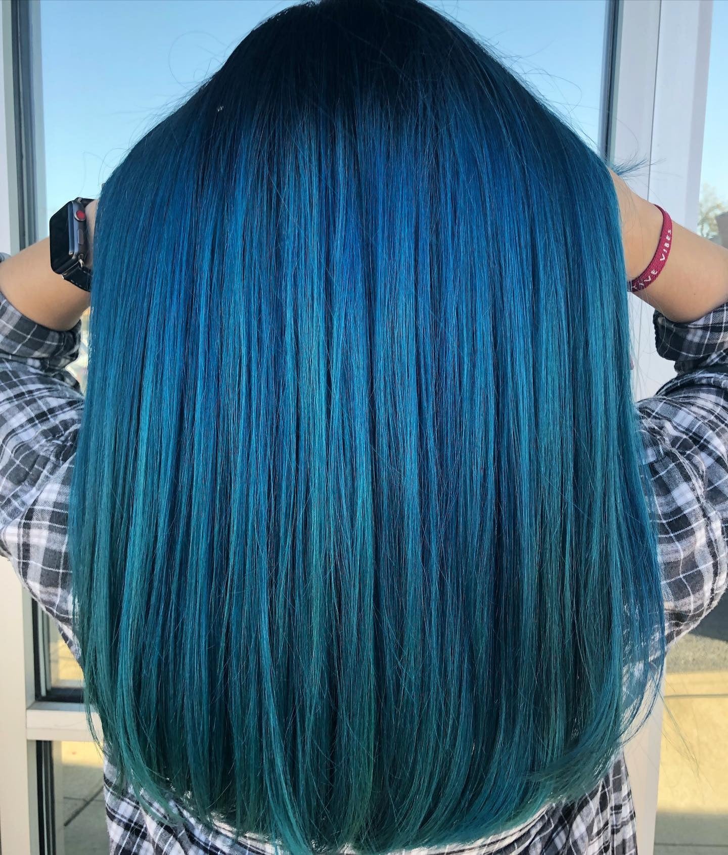 4. Sleek Teal Straight Cut (Teal Hair Color)