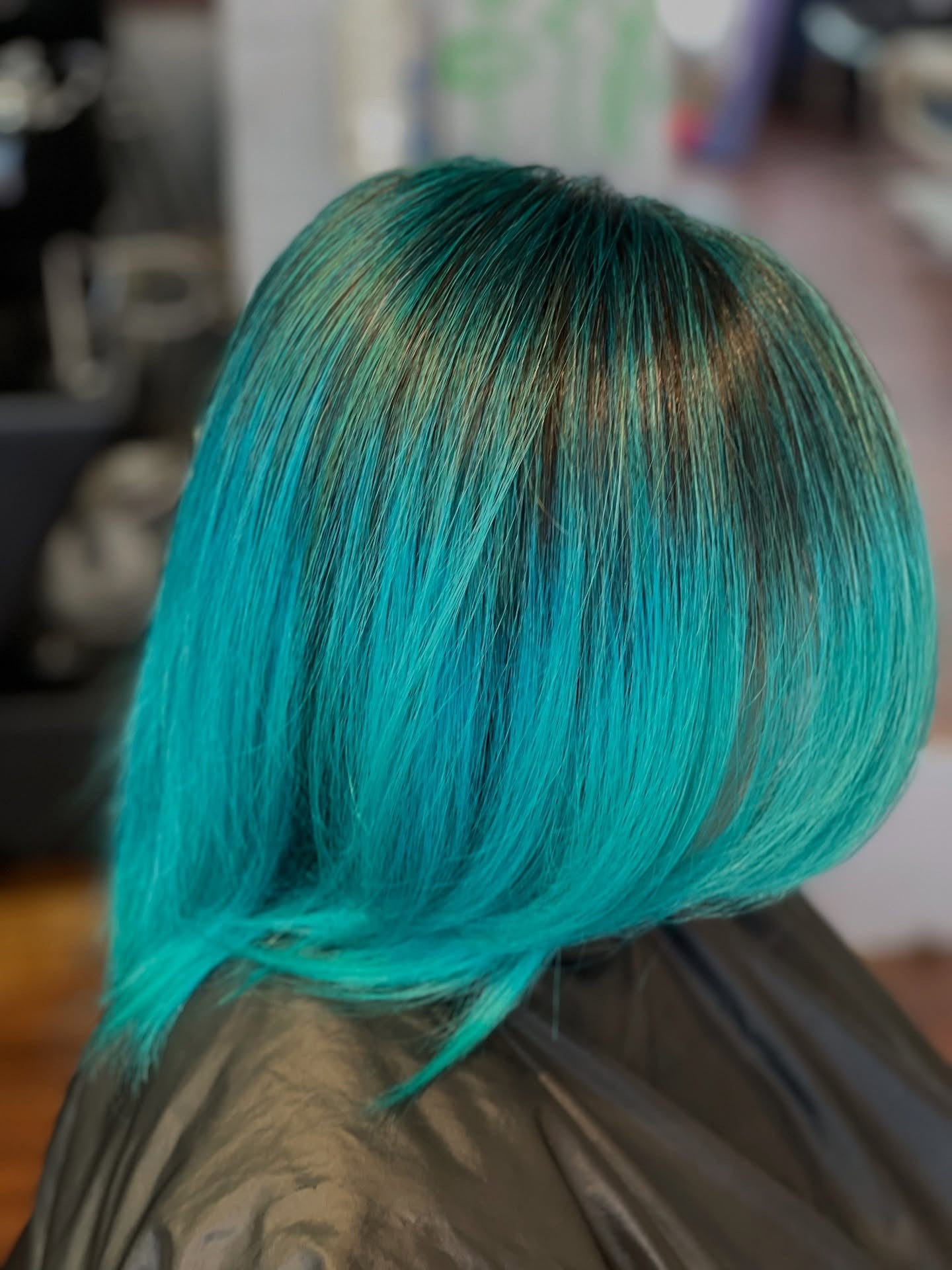 9. Teal Angled Lob (Teal Hair Color)