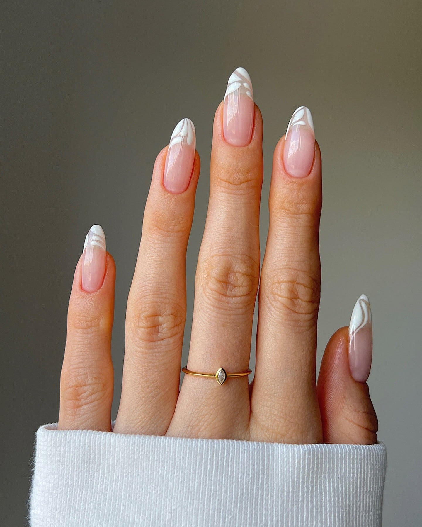 2. White Abstract French Tips (Clear Nail Ideas)