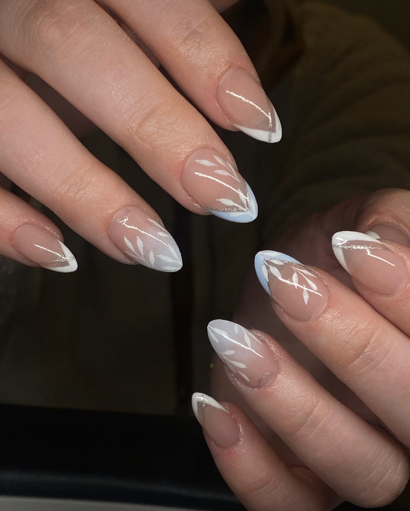 3. Leaf-Inspired French Design (Clear Nail Ideas)