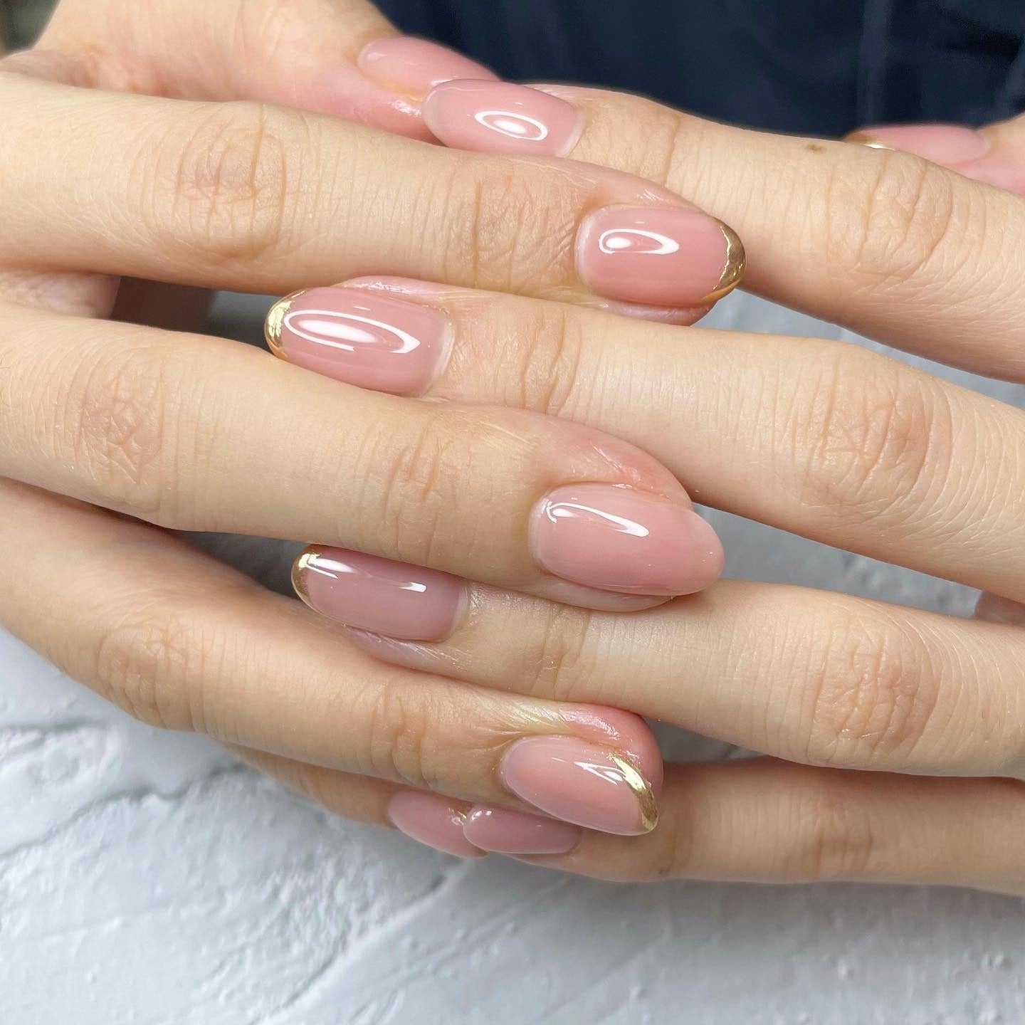 9. Nude Gloss with Gold Detailing (Clear Nail Ideas)