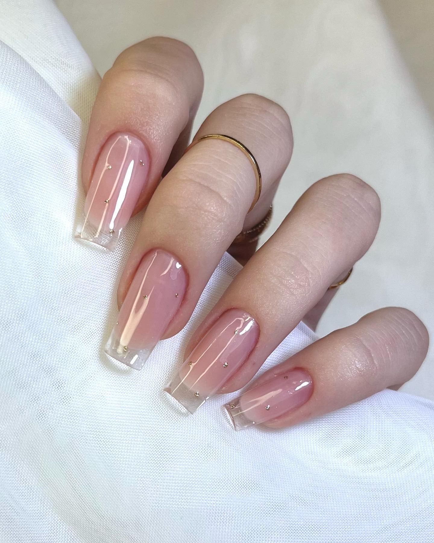 13. Clear-Tipped Square Nails with Gold Specks (Clear Nail Ideas)