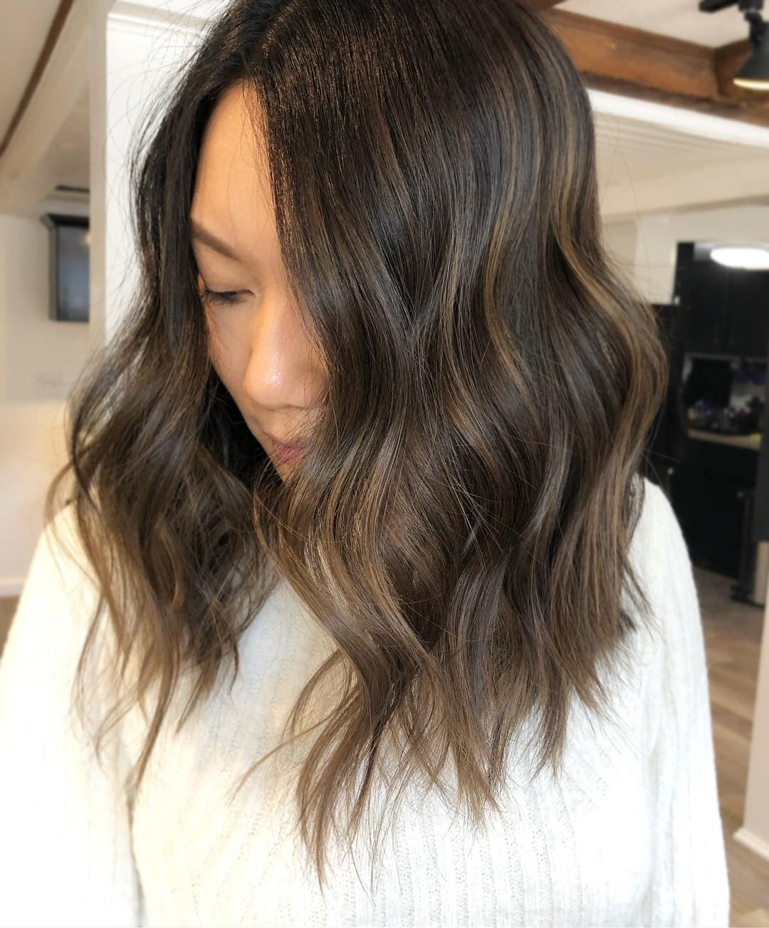 3. Smoky Brunette Lob (Cool Brown Hair Color)