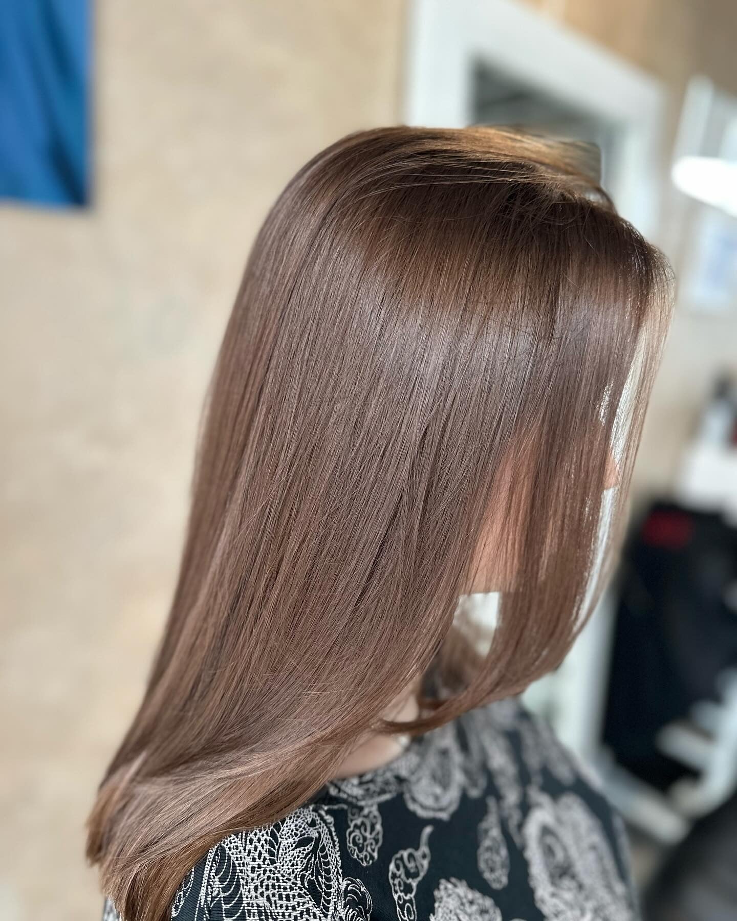 6. Glossy Caramel-Tinted Brown (Cool Brown Hair Color)