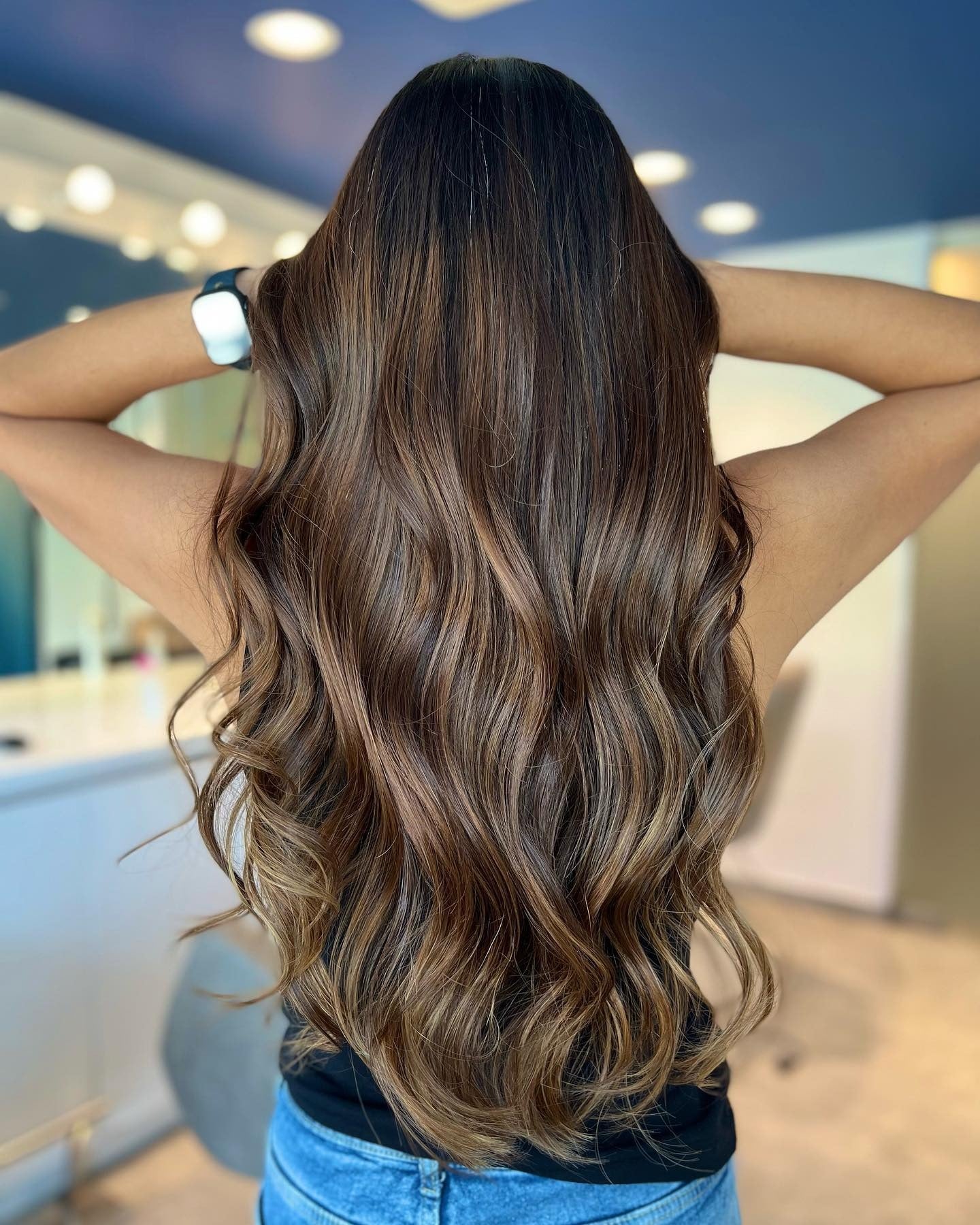 13. Caramel-Infused Brunette (Cool Brown Hair Color)