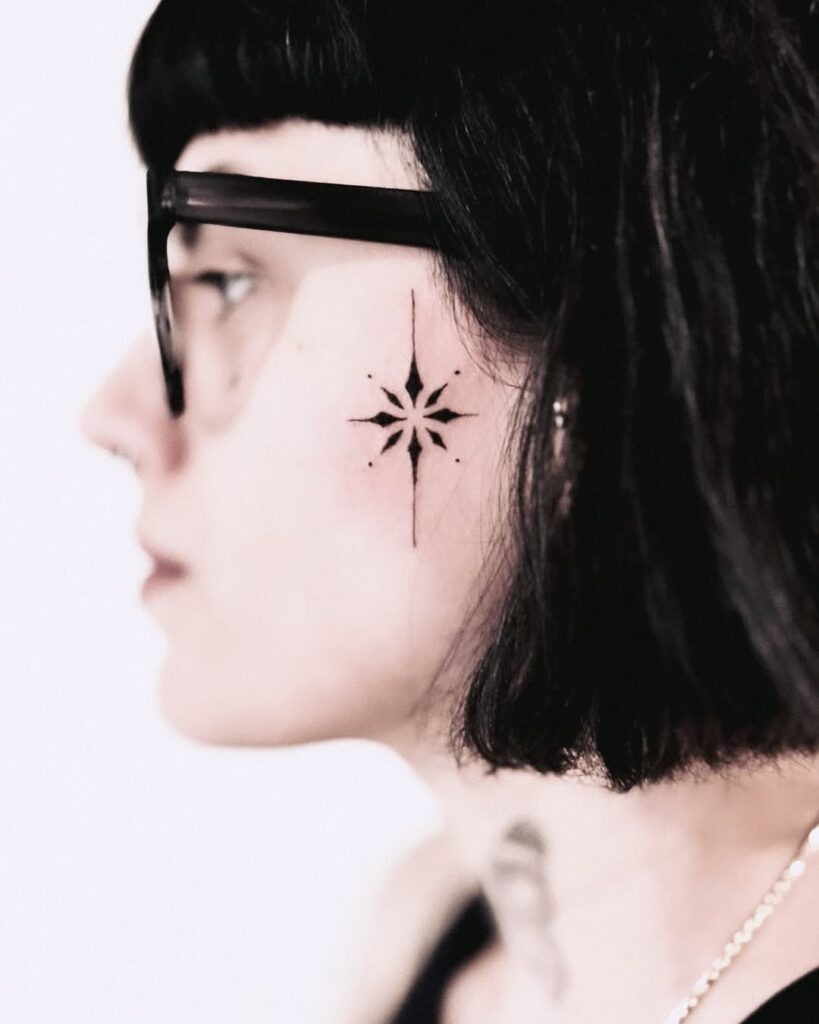  Small Ornamental Face Tattoo