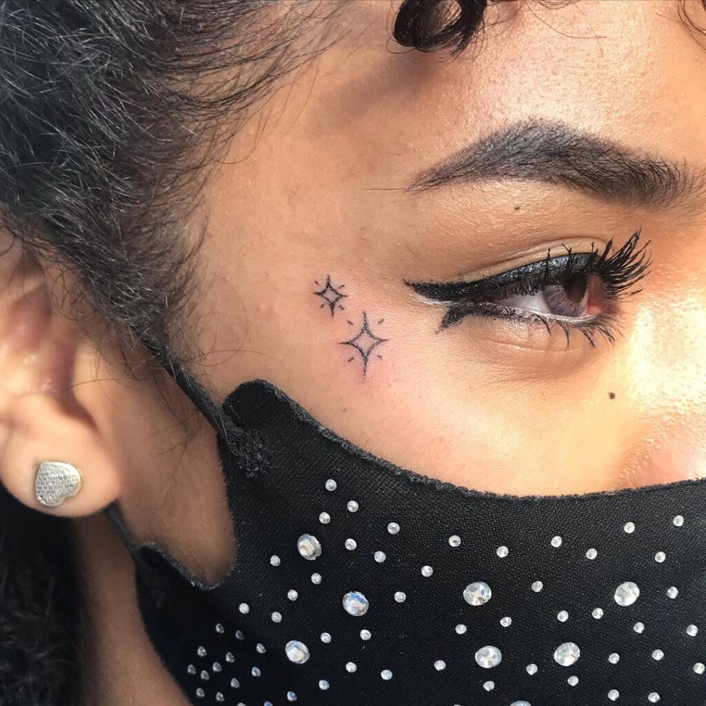 Tiny Stars Face Tattoo