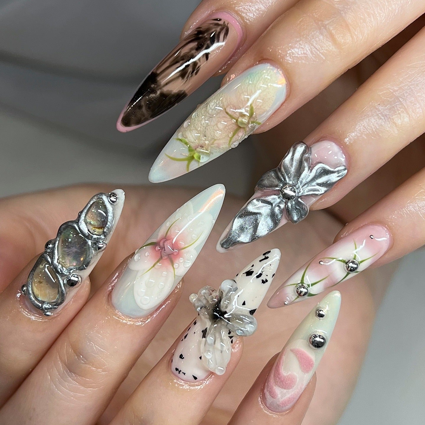 1. Sculpted Art Nails with Metallic Accents (Cool Nail Ideas)