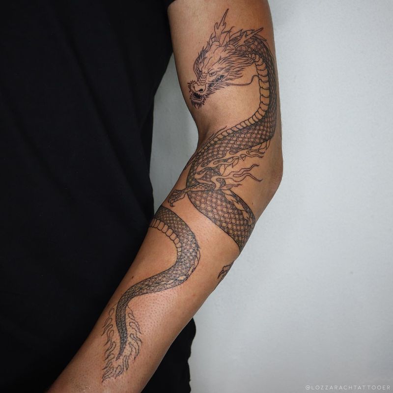 Dragon Arm Wrap Tattoo