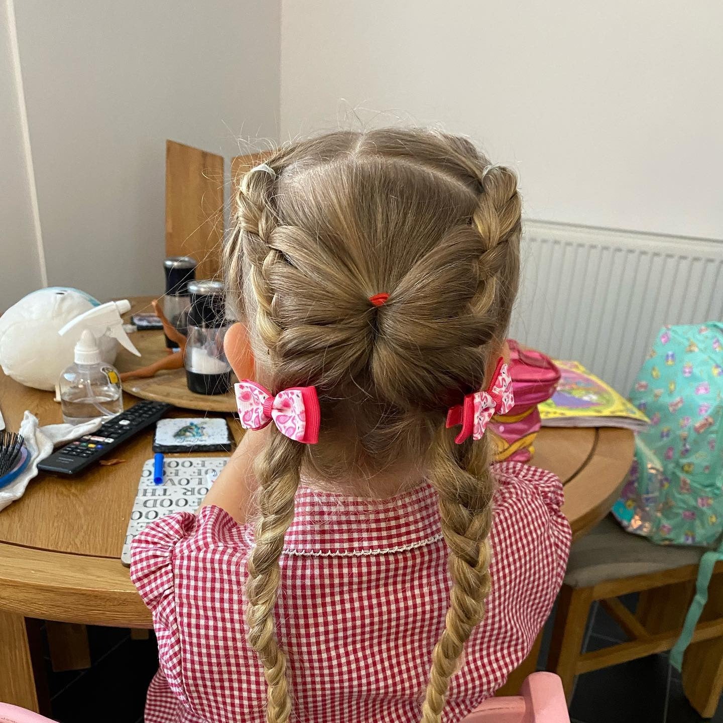 7. Classic Double Dutch Braids with Bow Accents – Light Golden Blonde (Cute Hairstyles)