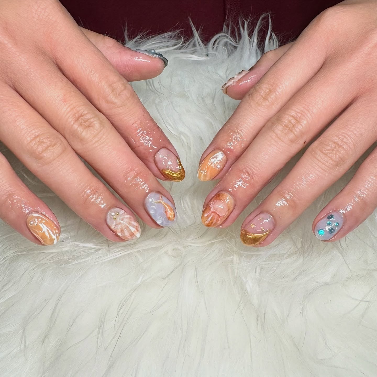 7. Sunset Swirls and Gold Foil (Cute Nail Ideas)