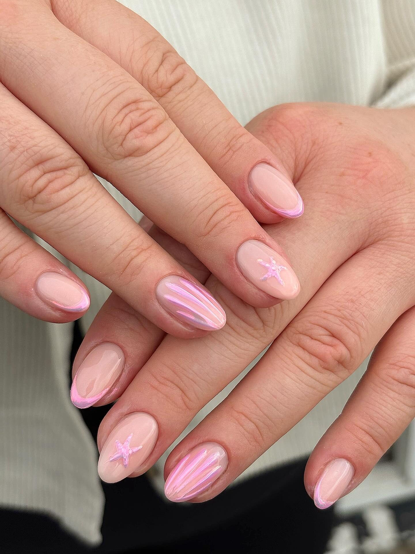 2. Iridescent Pink Almond Nails (Light Pink Nail Ideas)