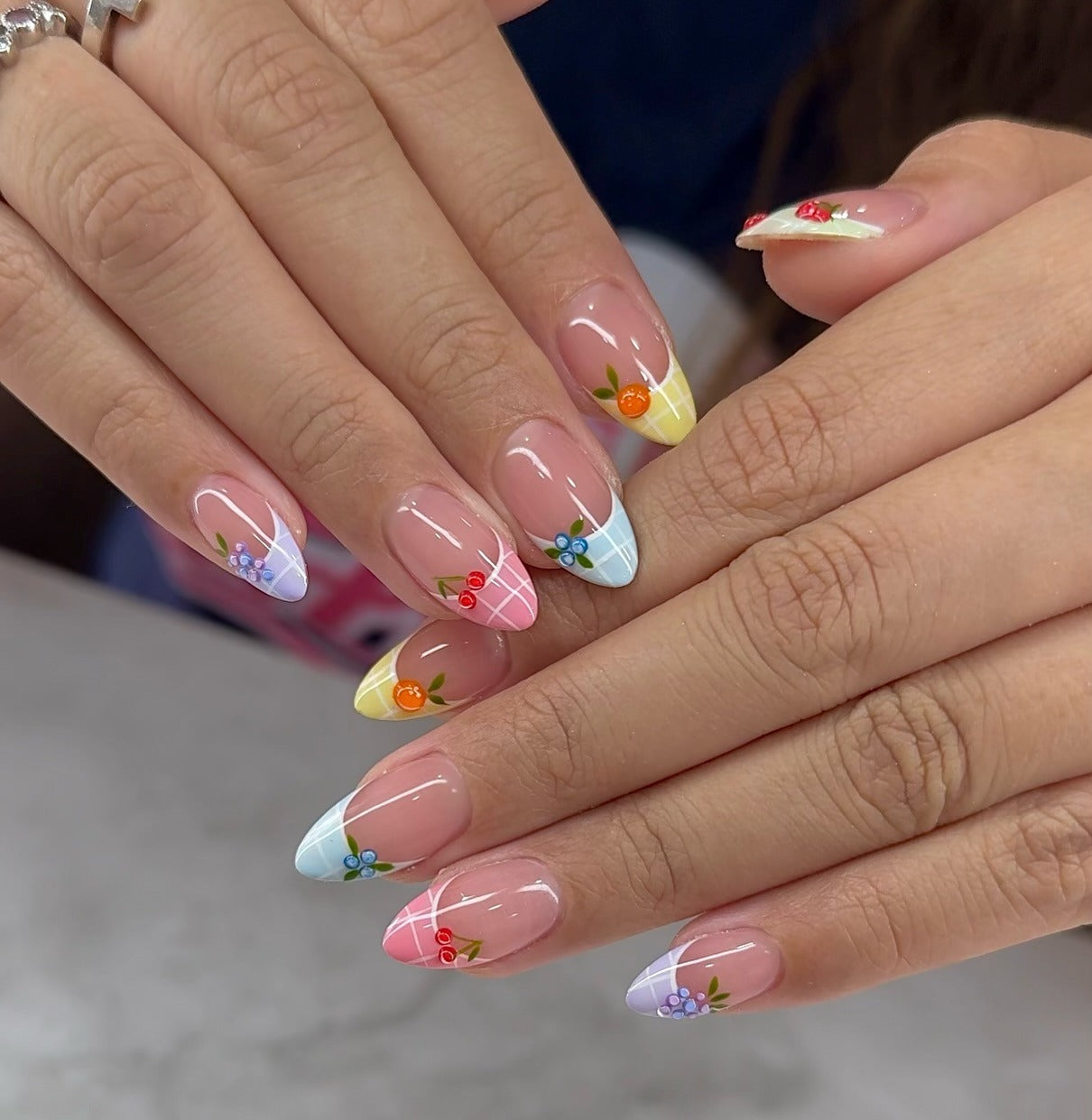 15. Pastel Plaid French with Tiny Fruit Motifs (Nail Ideas for Work)