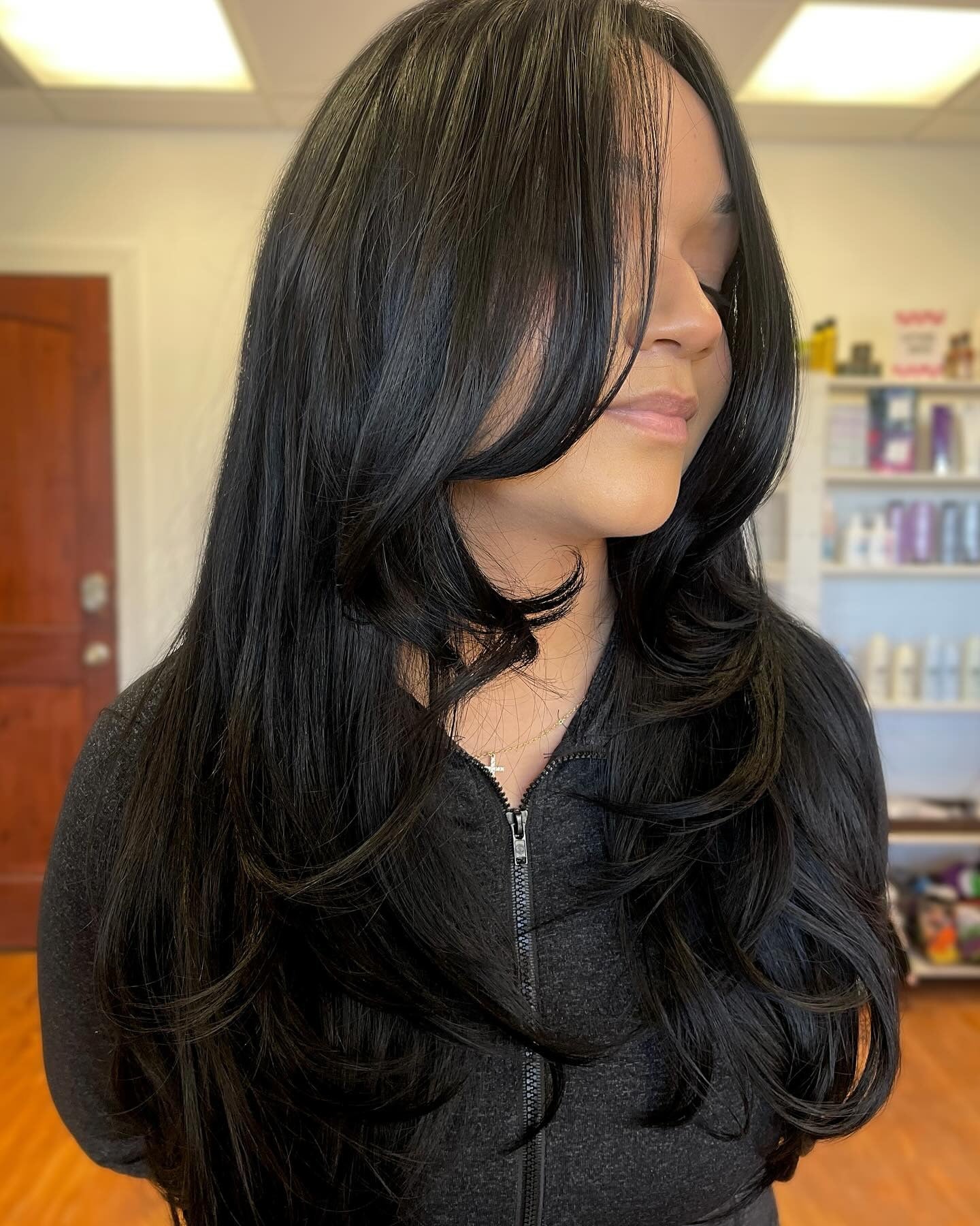 1. Layered Jet Black with Face-Framing Curtain Bangs (Face-Framing Haircuts)