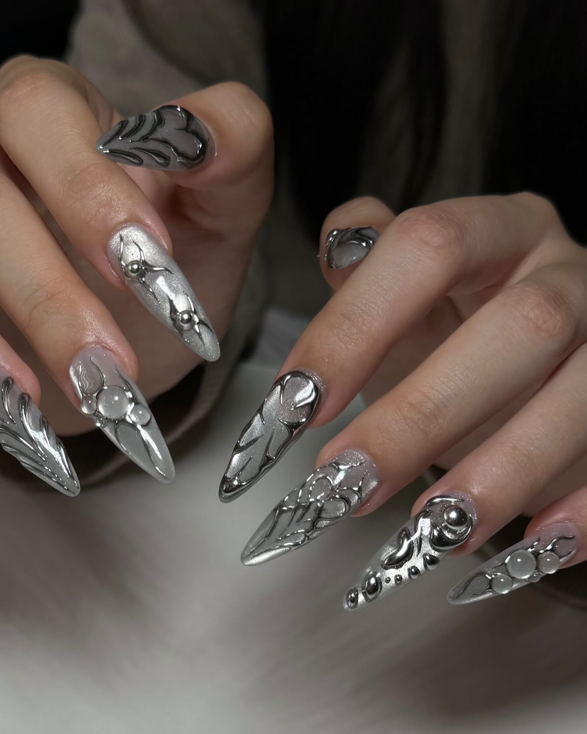 1. Liquid Metal Texture with Chrome Finish (Grunge Nail Ideas)