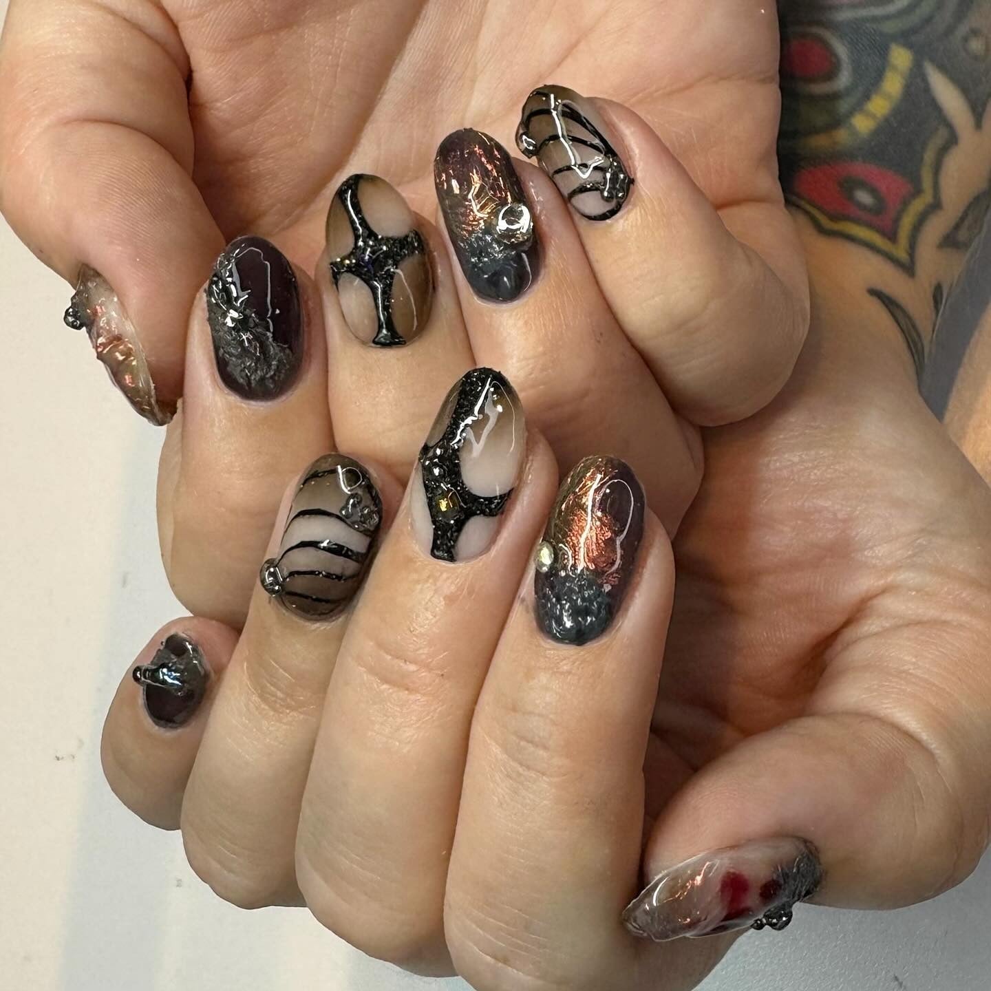 8. Distorted Webbed Flame with Mixed Finishes (Grunge Nail Ideas)
