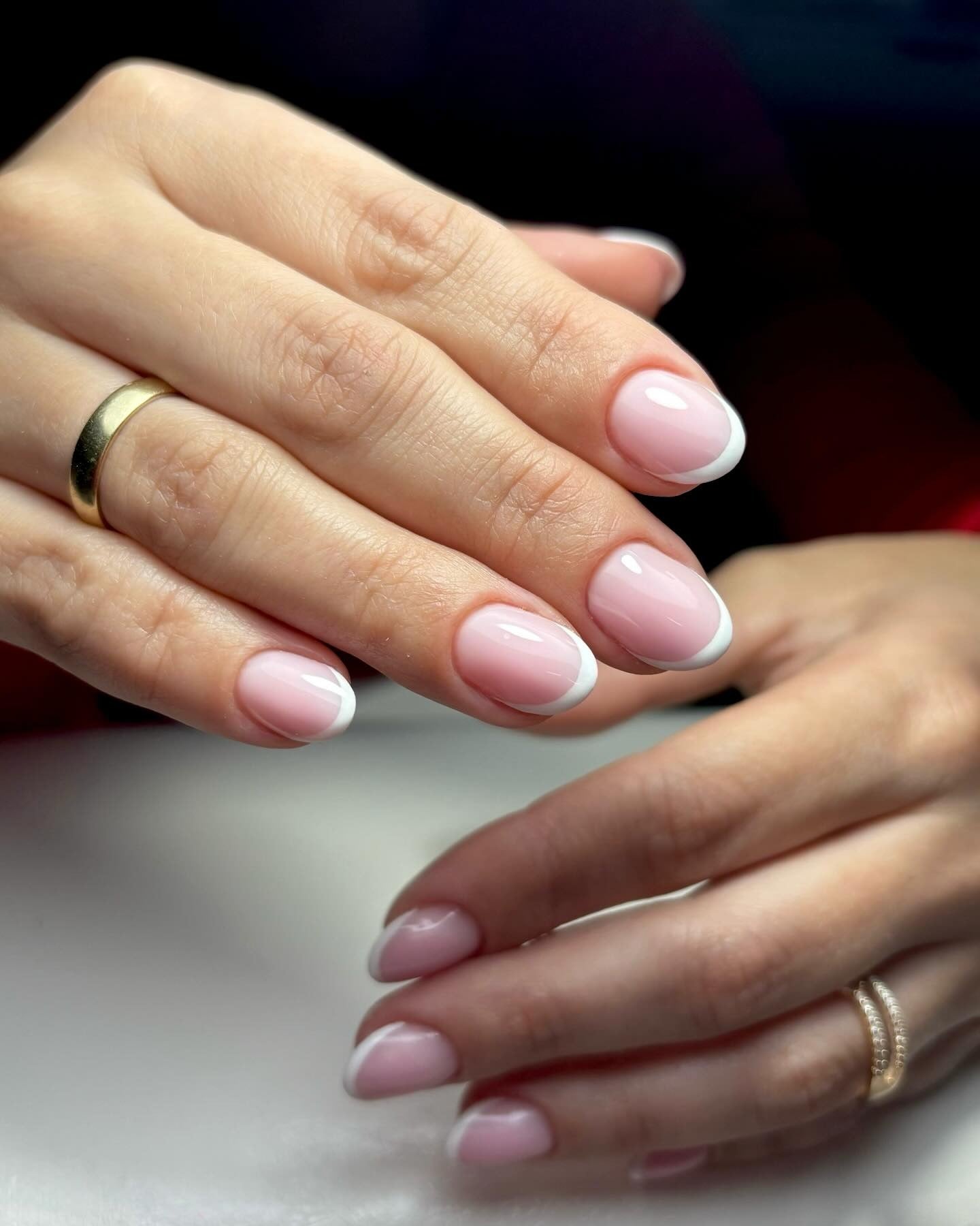 4. Classic Oval French with Subtle Sheen (French Manicure Nail Ideas)