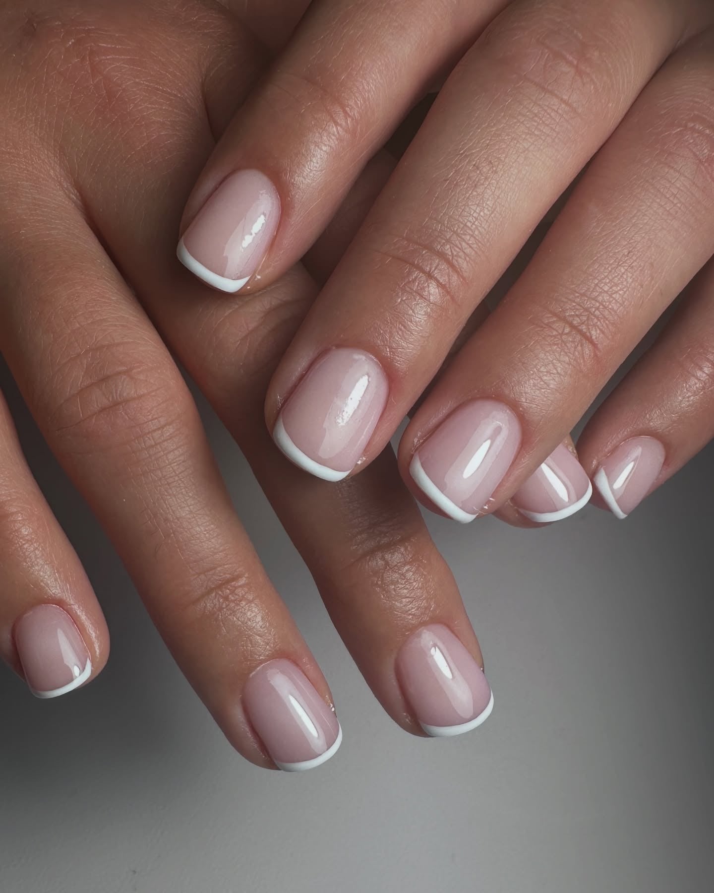 5. Minimalist Short French with Crisp White Tips (French Manicure Nail Ideas)