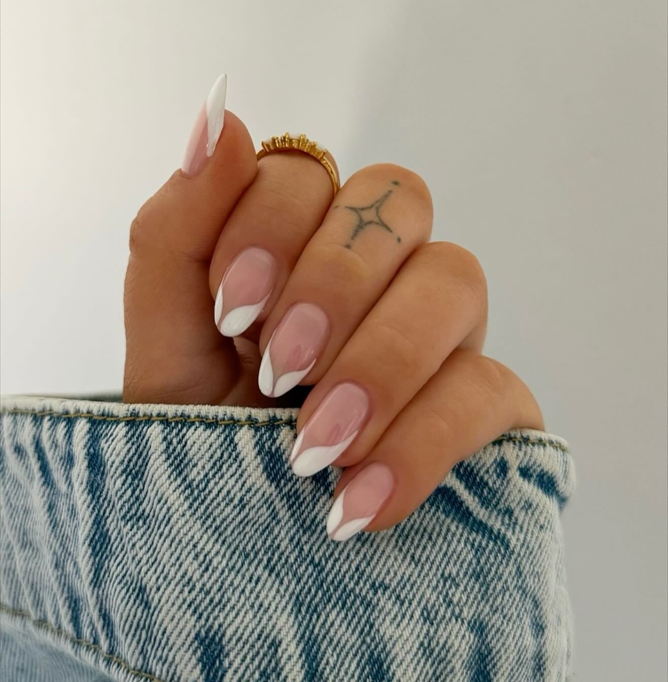 8. Almond French with Flowing White Tips (French Manicure Nail Ideas)