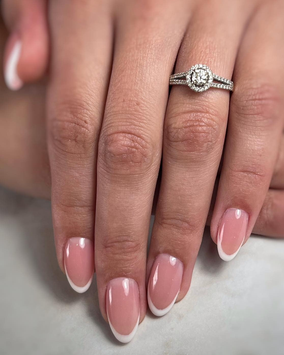 14. Oval French with Subtle White Curve (French Manicure Nail Ideas)