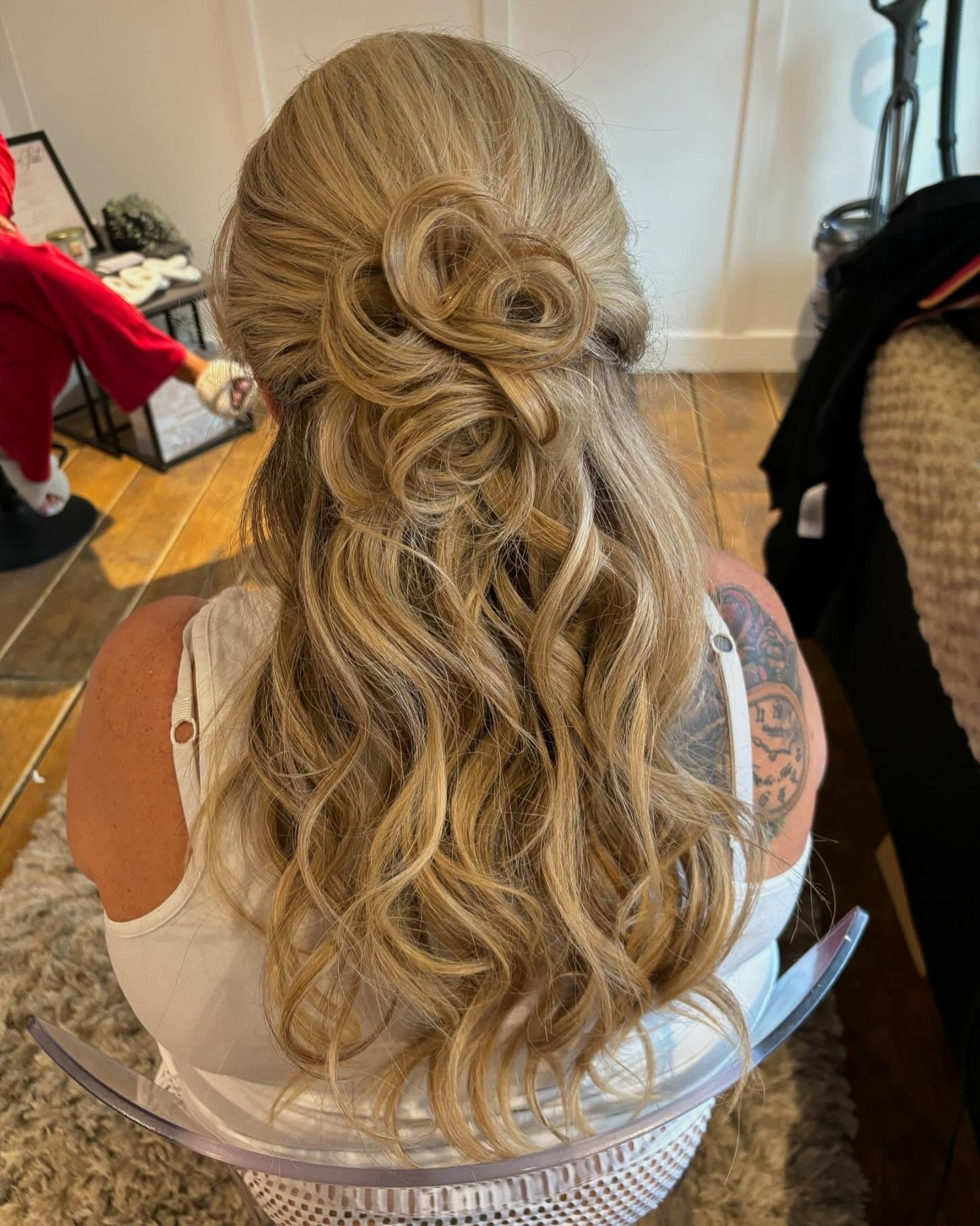 9. Golden Blonde Twisted Half-Up with Rosette Detail (Birthday Hairstyles)