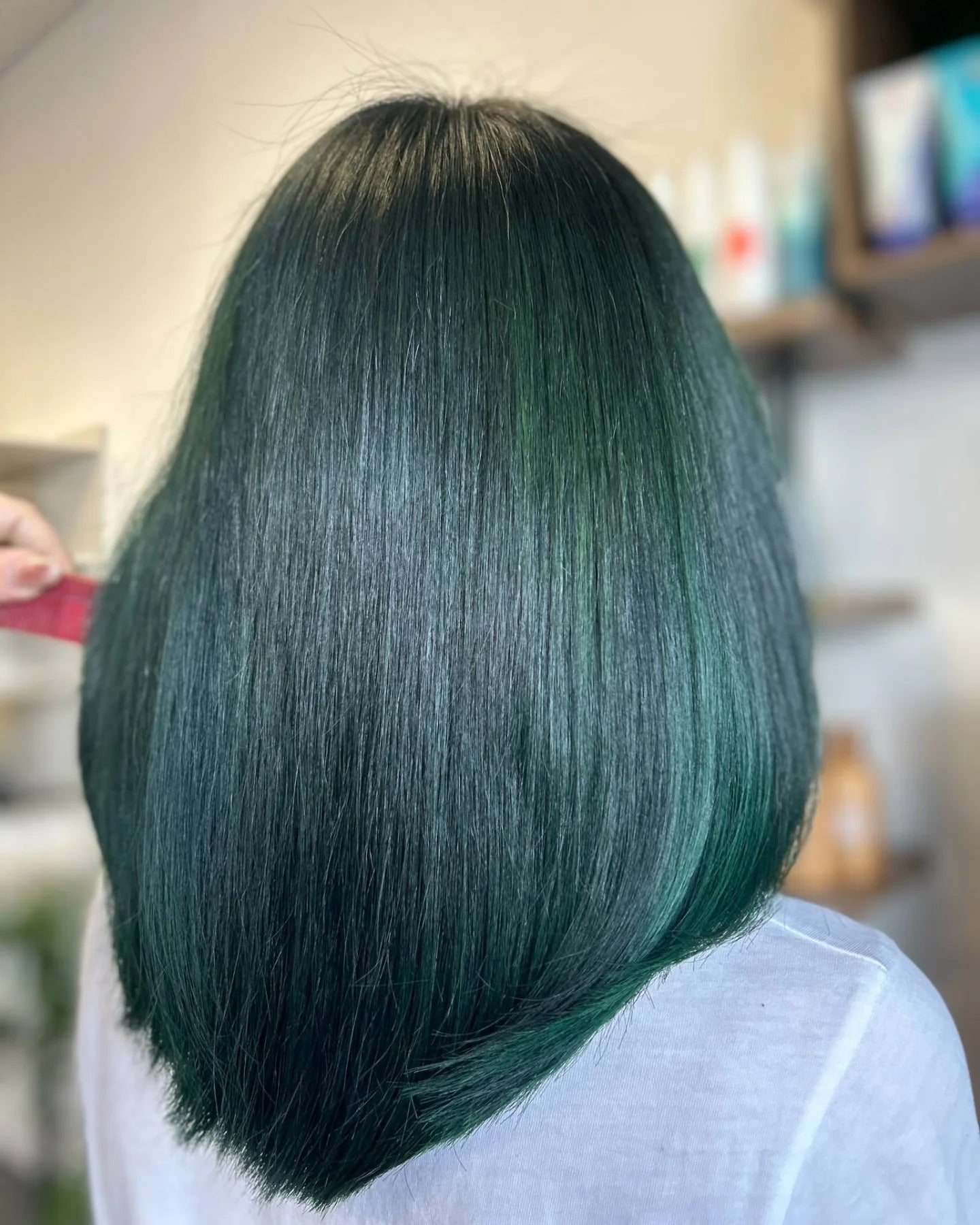 4. Sleek Green Lob (Green Hair Color)