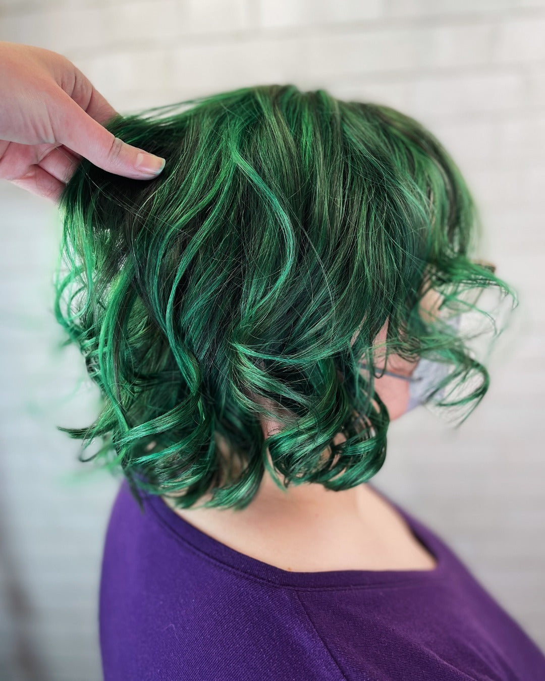 12. Shimmering Emerald Curls (Green Hair Color)