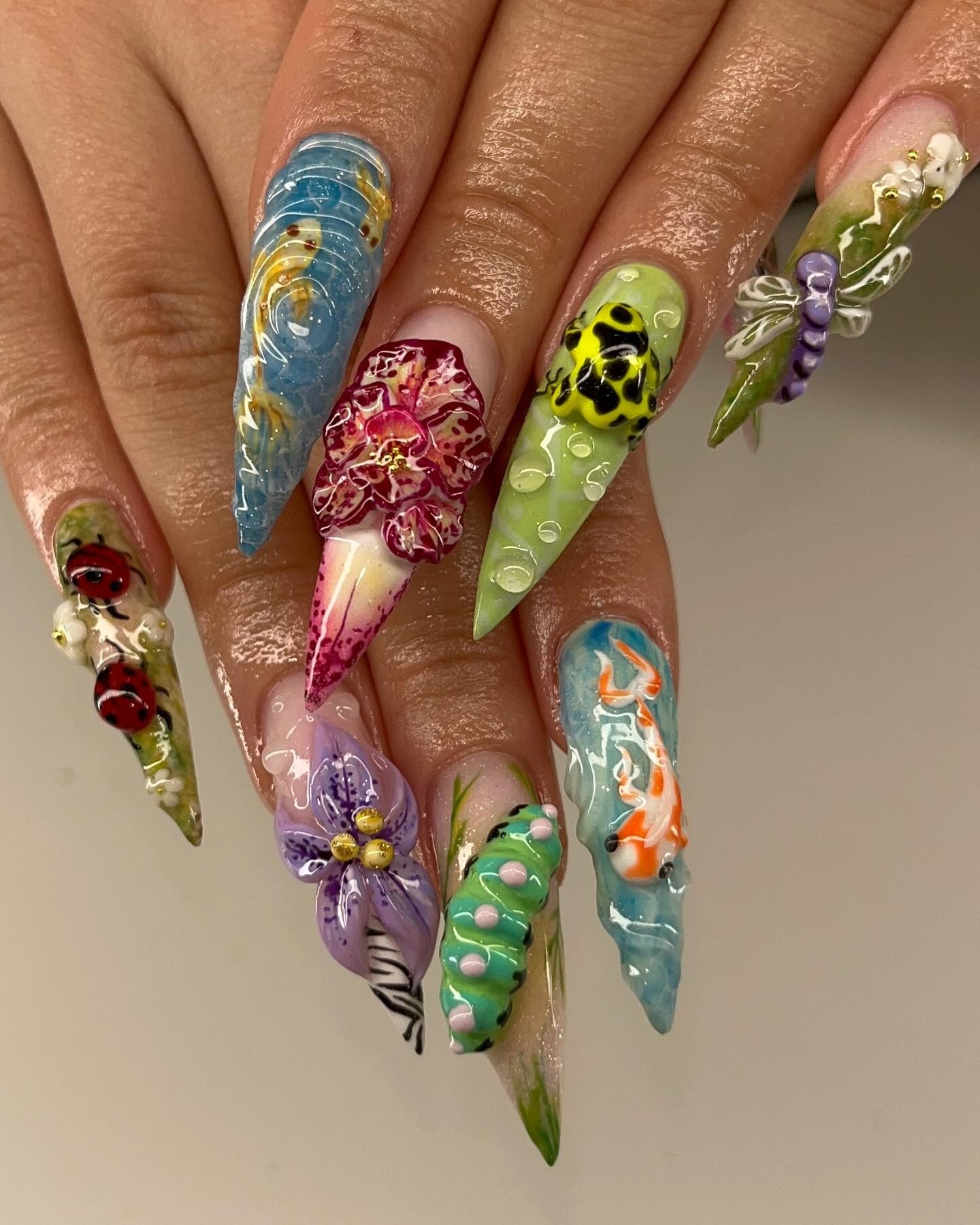 7. Garden Creature Showcase (Nature Nail Ideas)