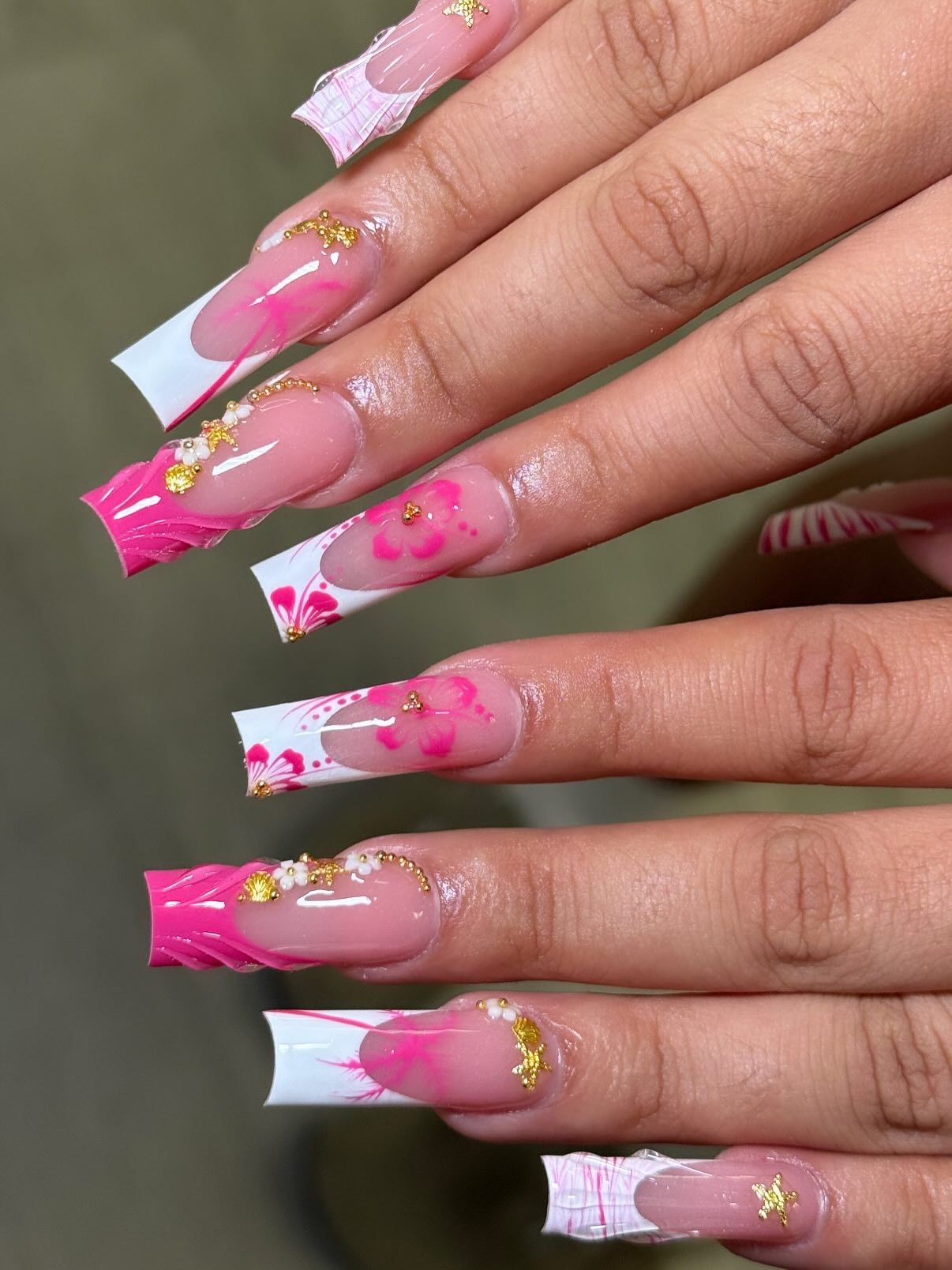 1. Pink Floral Elegance with Gold Accents (Pink and White Nail Ideas)