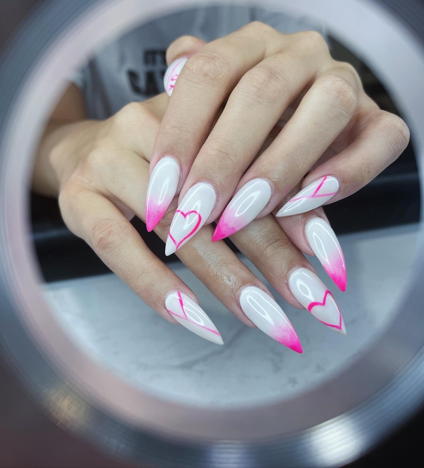 8. Pink-Tipped Stilettos with Heart Art (Pink and White Nail Ideas)