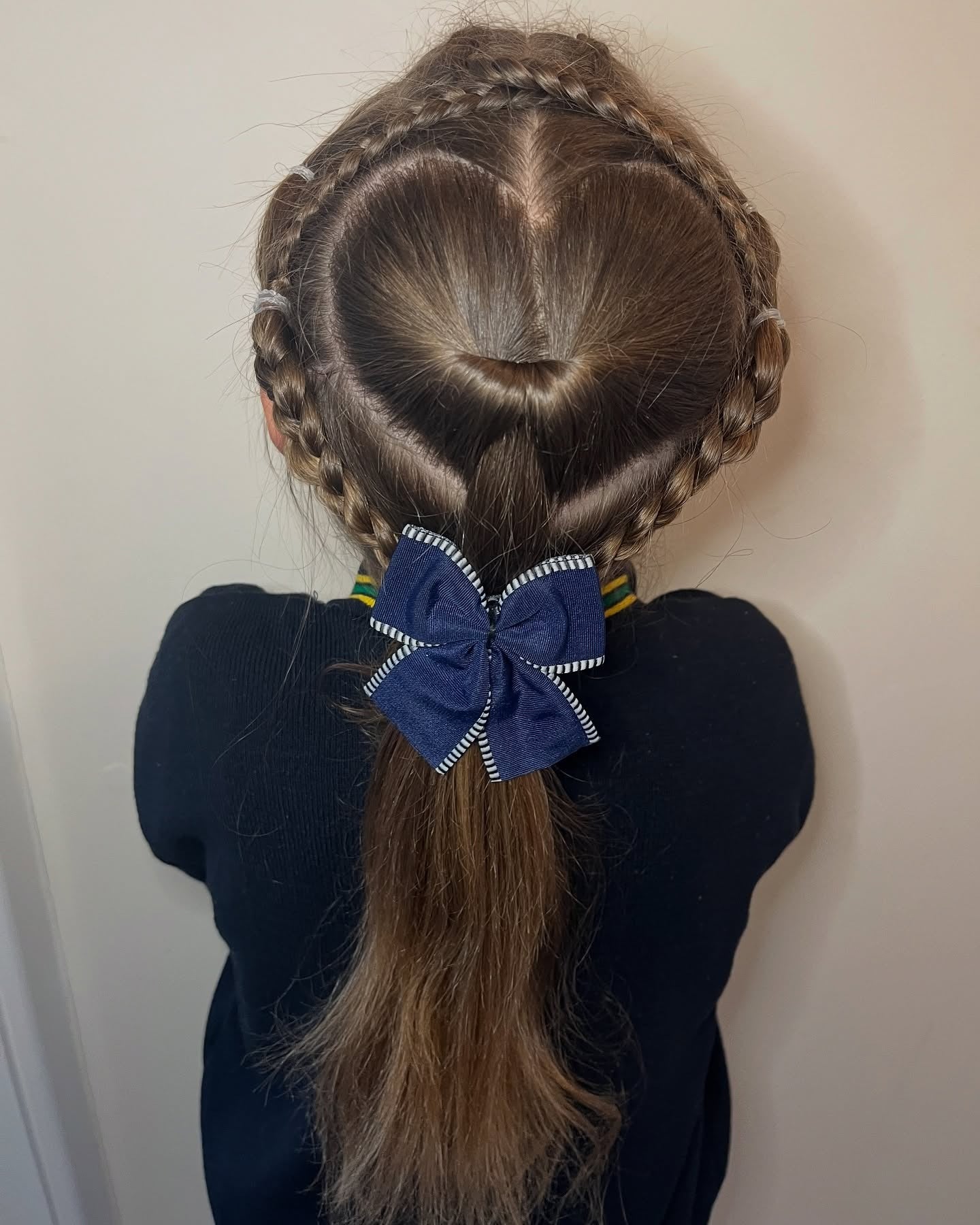 3. Heart-Shaped Braid with Navy Bow on Light Brown Hair (Hairstyles For School)