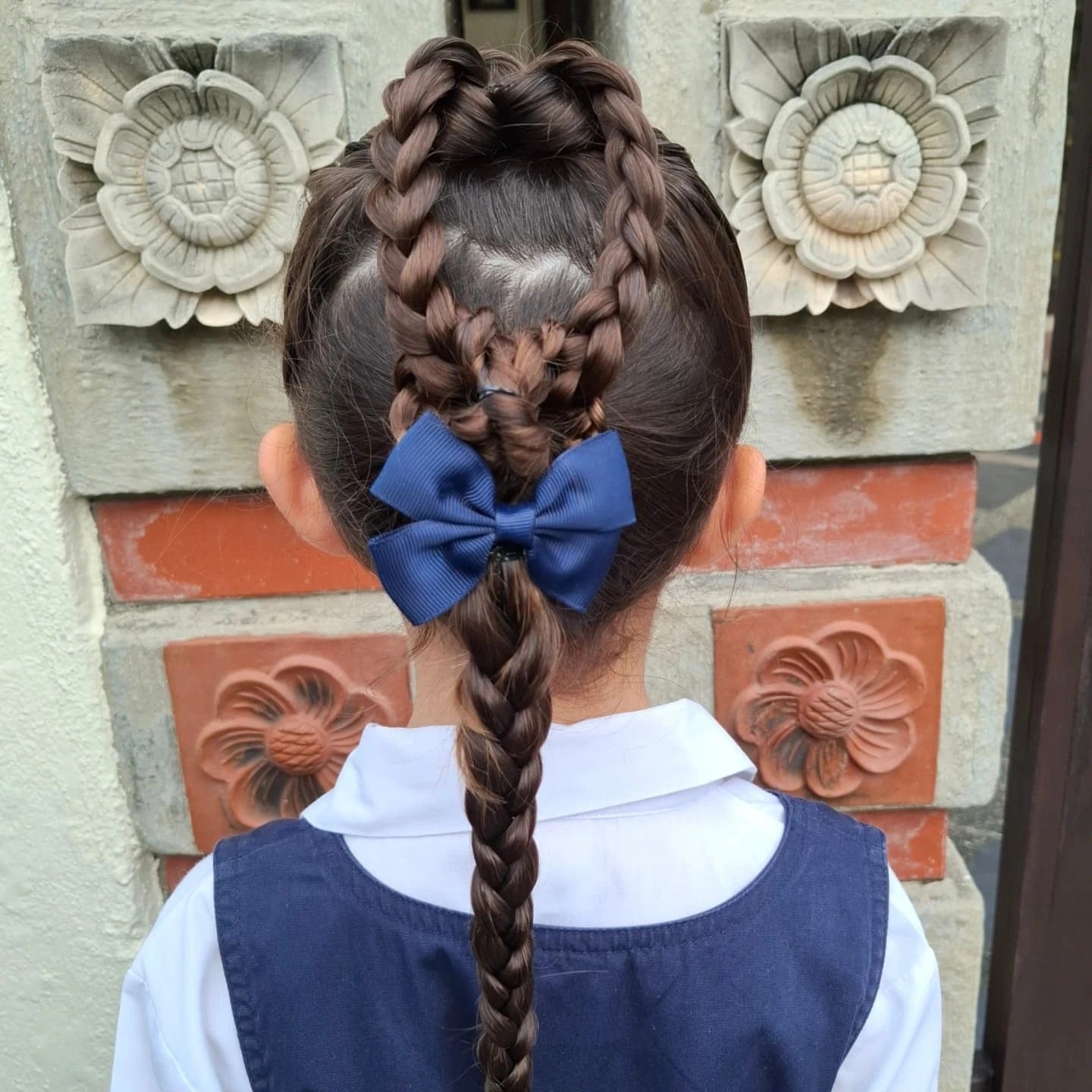 7. Heart Braid into Long Plait with Blue Bow on Medium Brown Hair (Hairstyles For School)