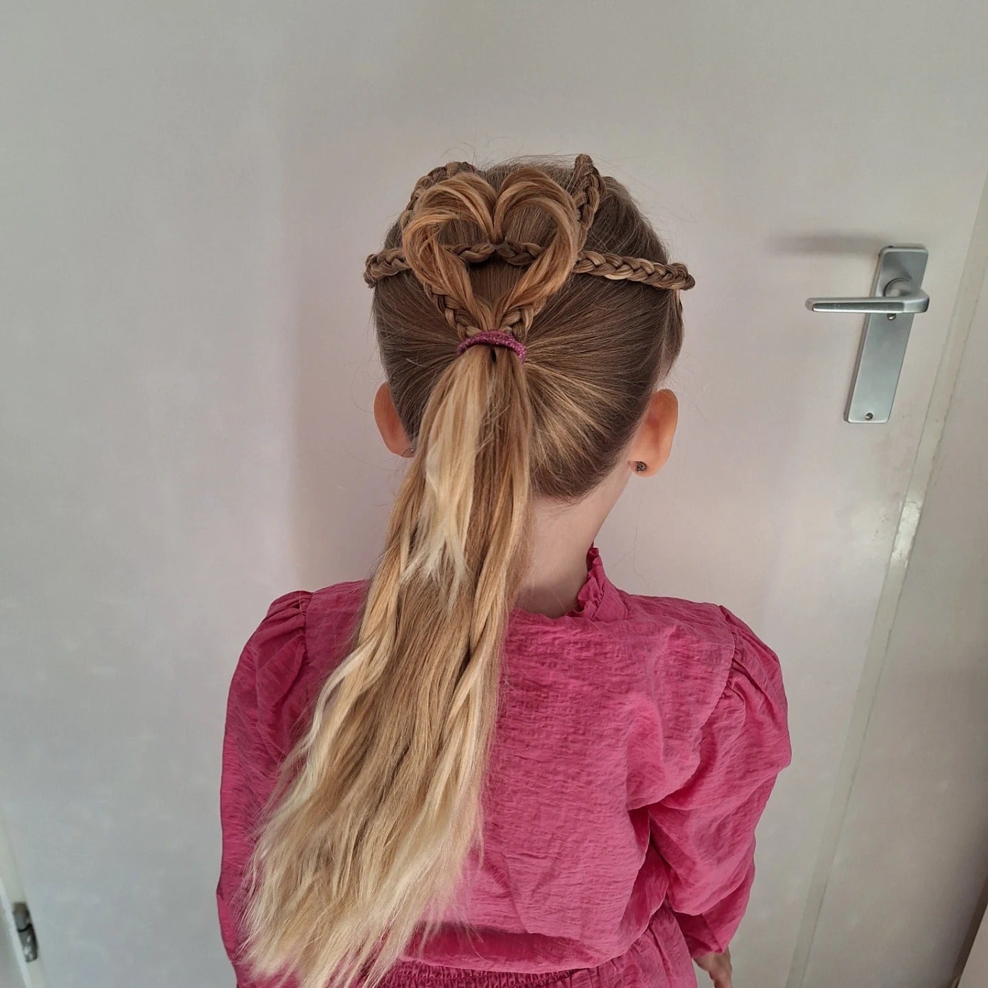 11. Heart Ponytail with Braided Accents on Blonde Hair (Hairstyles For School)