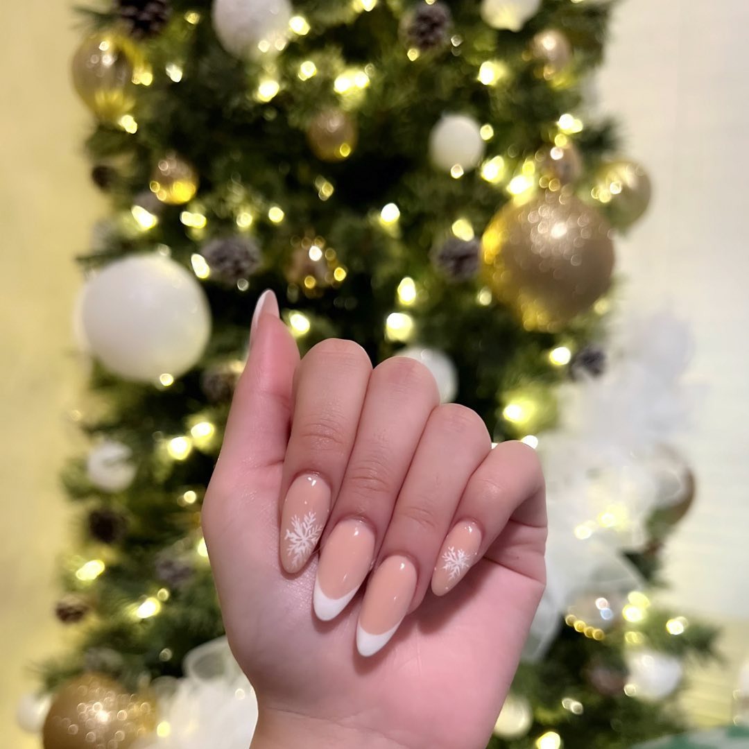 10. Snowflake French with Nude Base (Holiday Nail Ideas)