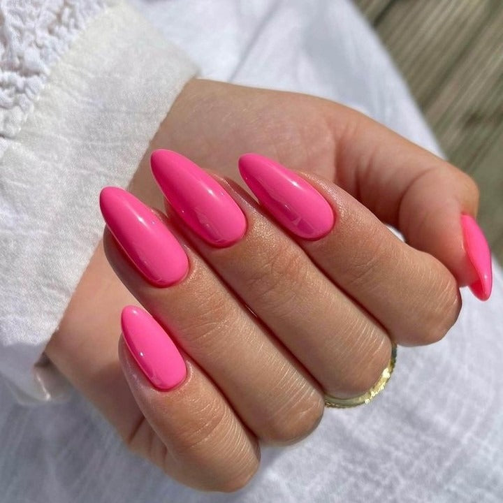 5. Sleek Pink Almonds (Hot Pink Nail Ideas)