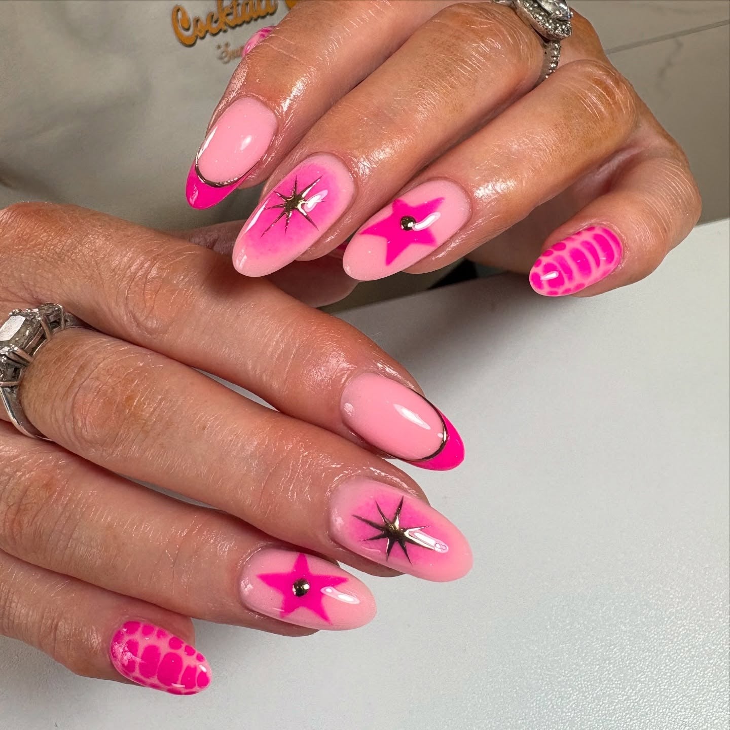 7. Starry Pink Accents (Hot Pink Nail Ideas)