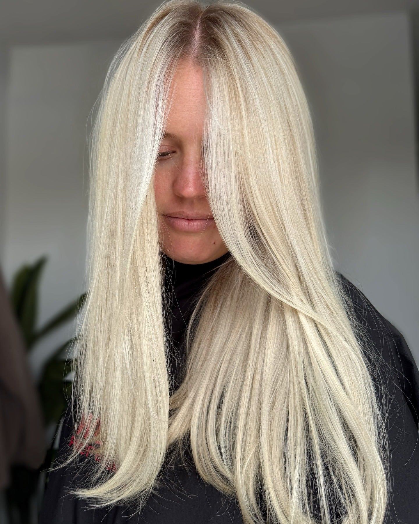 14. Platinum Blowout Layers with Curtain Fringe (Platinum Blonde Hair)