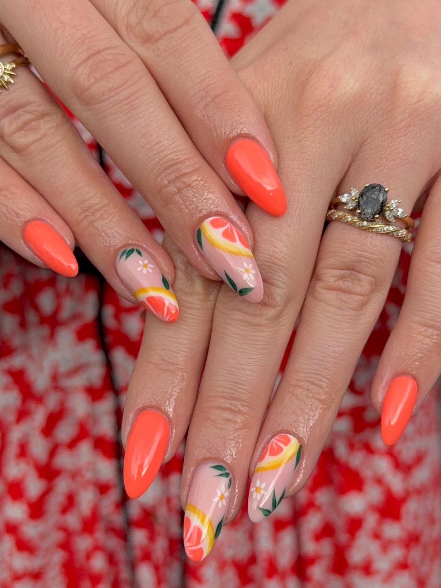 10. Grapefruit Garden Almond Nails (Orange Color Nail Ideas)