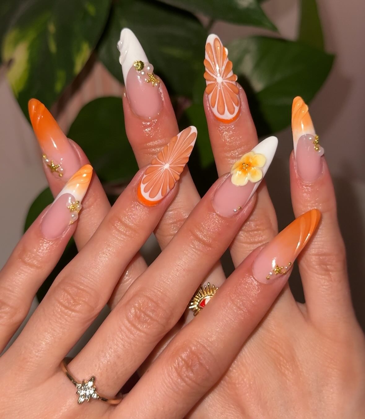 13. Citrus Garden Stiletto Nails (Orange Color Nail Ideas)
