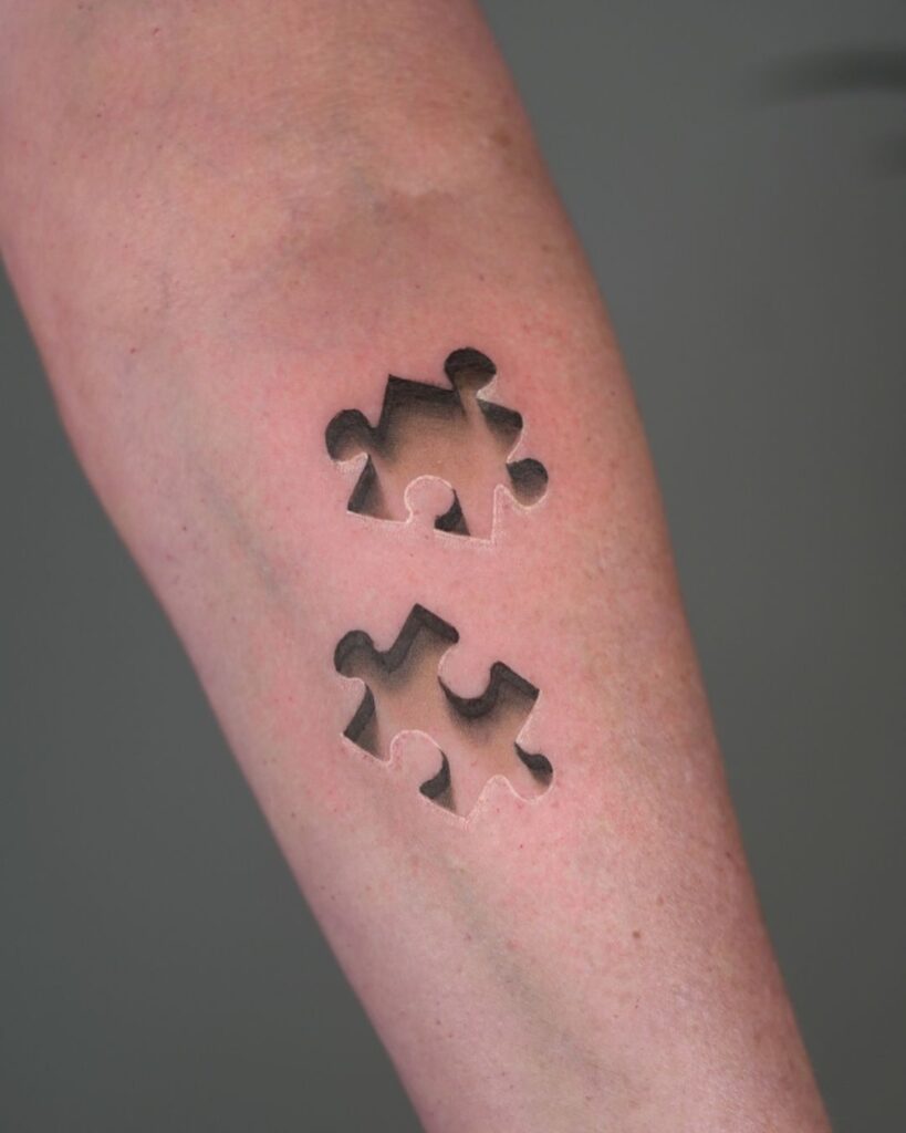 3D Puzzle Pieces Tattoo