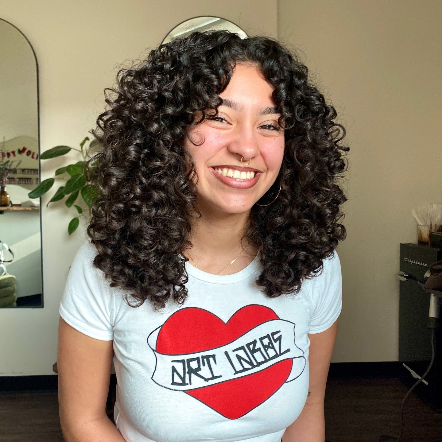 4. Curly Wolf Cut with Rounded Volume (Layered Curly Hairstyles)