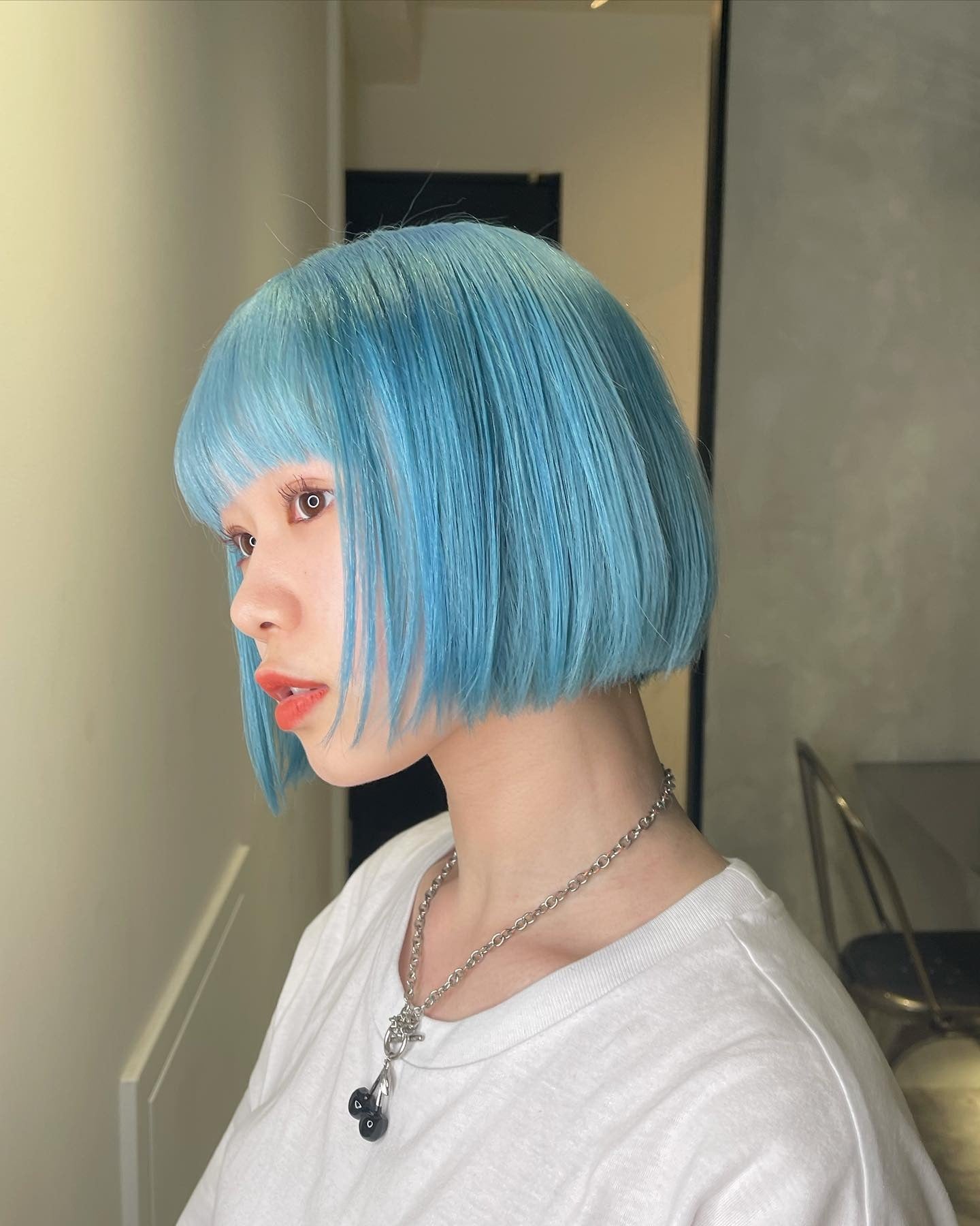 1. Sleek Blunt Bob with Full Fringe in Light Blue (Light Blue Hair Color)